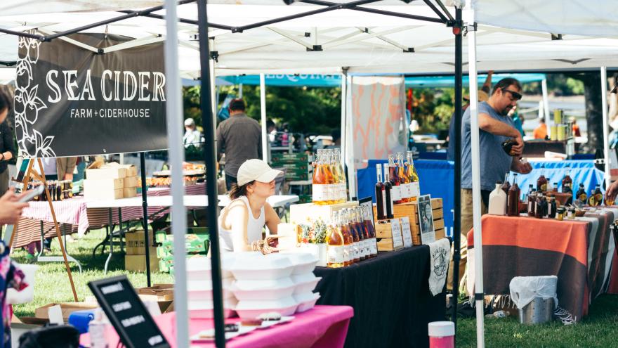 Outdoor farmers market with tents