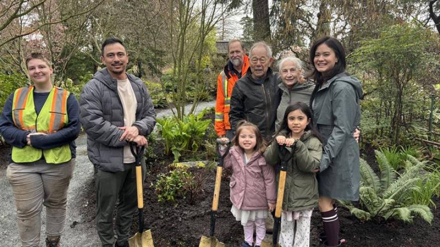 Takata family and Esquimalt staff after planting the bonsai.